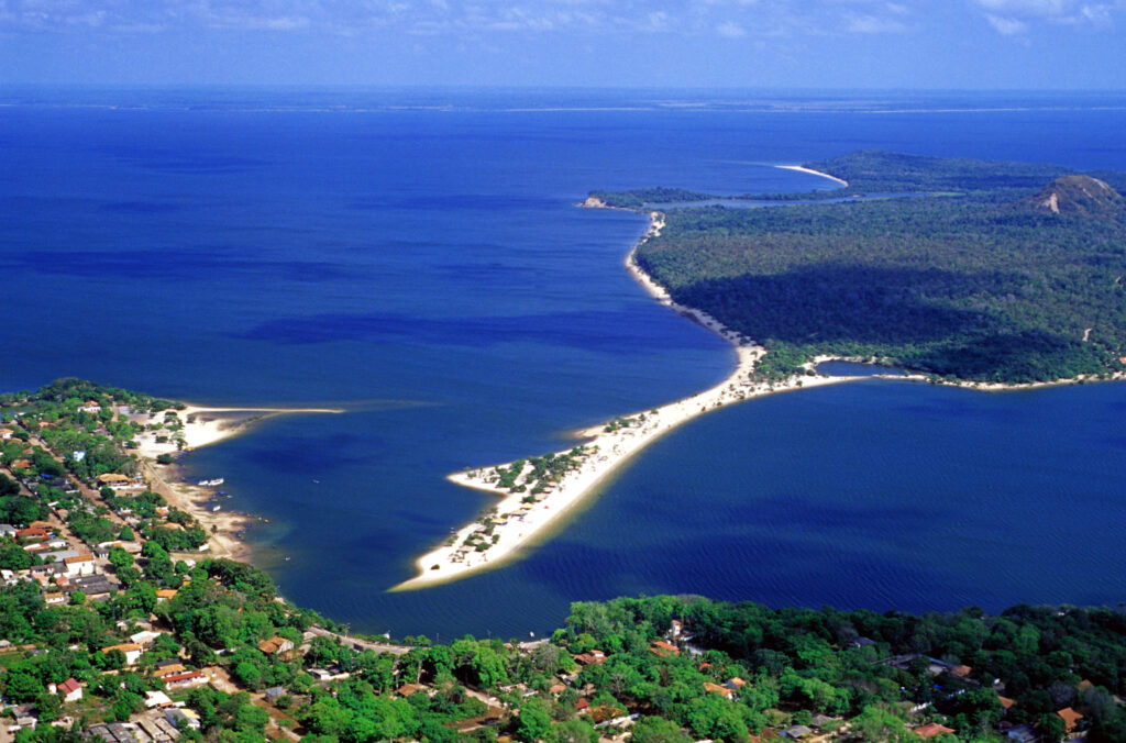 A scenic view of Alter do Chão, with its pristine white sand beaches and crystal-clear waters, nestled in the heart of the Amazon rainforest.