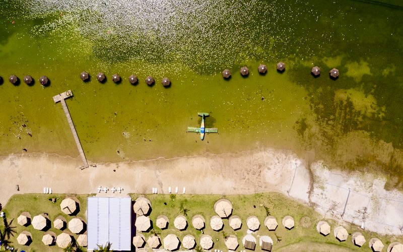 A peaceful view of Praia da Figueira, with its golden sands and clear waters, located in Mato Grosso do Sul, Brazil.