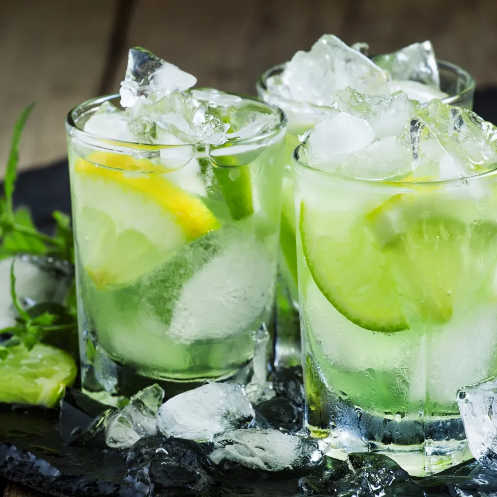 Caipirinha, Brazil’s signature cocktail, made with cachaça, lime, sugar, and ice, offering a perfect balance of sweet, sour, and strong flavors.