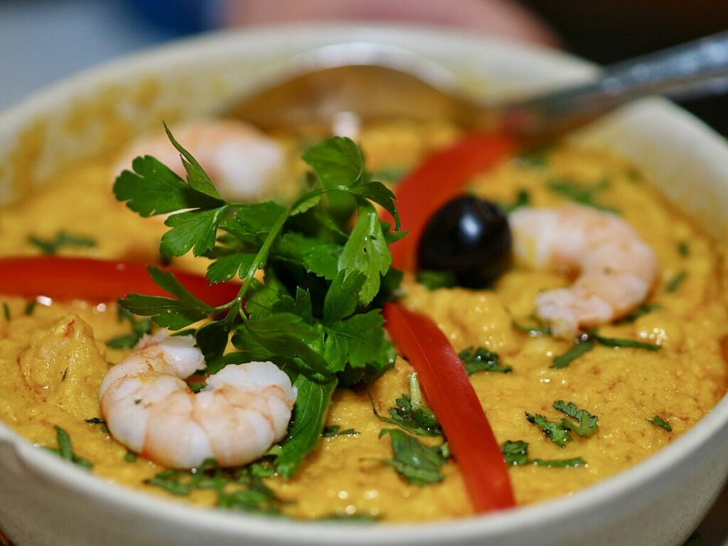 Traditional Brazilian Vatapá with shrimp, peanuts, and coconut milk.