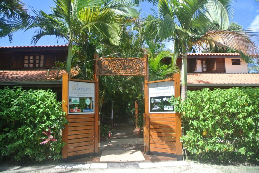 A charming pousada on Ilha do Mel, surrounded by lush tropical gardens, offering a peaceful and cozy escape near the beach."